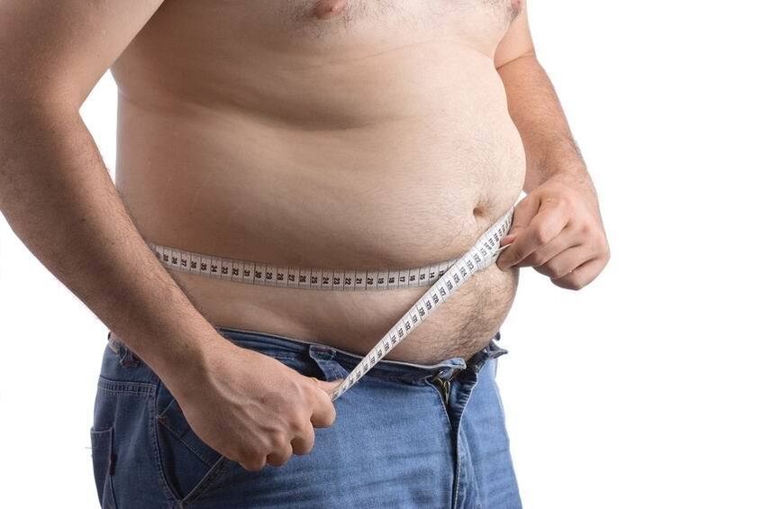 Full man measures the waist volume