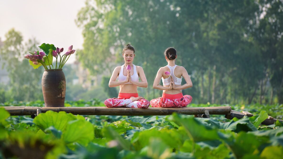 Girls in the lotus pose